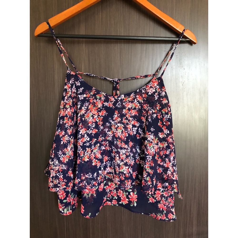 Navy blue top with 🌺